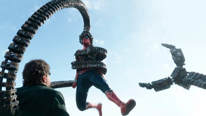 Dr. Octavius holds Spider-Man in his mechanical arms.